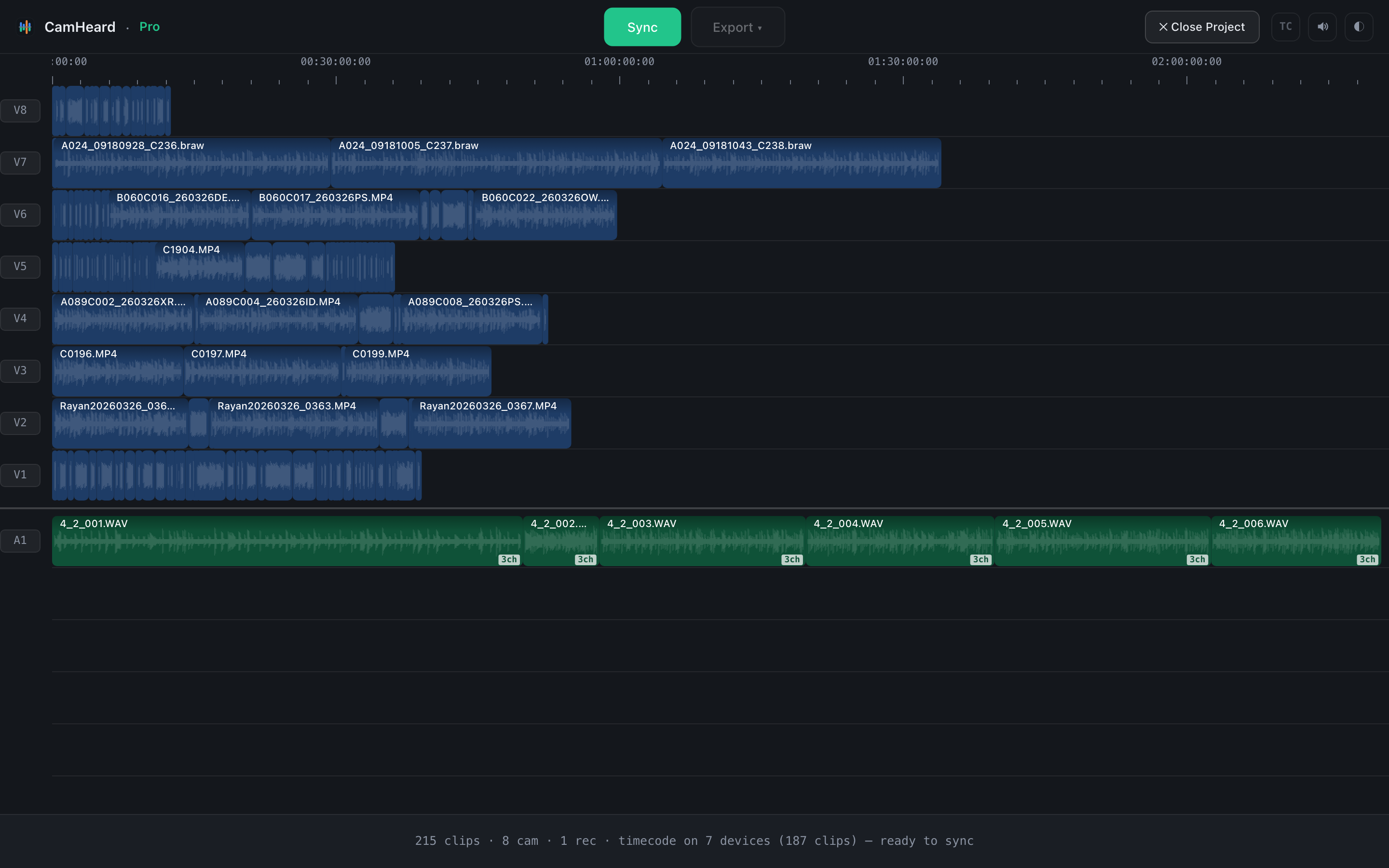 Eight cameras on shared timecode and a recorder: footage loaded, before the sync